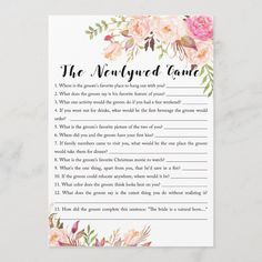 the newlywed game with pink flowers and greenery is shown on a white background