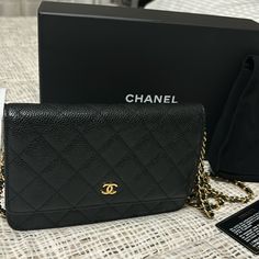 Beautiful Authentic Black Chanel Wallet On Chain Bag Made From Iconic Chanel Calfskin Caviar Leather Gold Hardware And Gold Snap Closure In Pristine Condition (Like New) Minimal Signs Of Wear Iconic Wine Interior That Is Very Clean All Zippers Work This Caviar Leather Style Is Not Sold Currently In Boutiques Snap Clasp And Leather Within Chain Were Replaced By The Chanel Boutique In Costa Mesa, Ca With Original Authentic Chanel Parts. Includes Chanel Bag, Box, Dust Bag, Original Purchase Receipt Chanel Wallet On Chain, Chanel Boutique, Purchase Receipt, Wallet On Chain, Chanel Wallet, Chanel Bags, Chain Bag, Leather Style, Chain Shoulder Bag