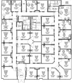 an office building floor plan with several rooms and one room on the first floor,