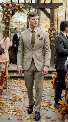 Looking for a unique outfit? Discover how to style a beige suit with an olive green tie for a modern yet timeless look! We’ll share tips on coordinating your shirt and accessories to create a stunning ensemble for any occasion. 🌟👔 #StylingTips #BeigeAndOlive #SuitStyle #ChicLooks #MensFashion Olive Green Tie Outfit Men, Fall Suits For Men Wedding, Beige Suit Wedding, Tan Groomsmen Suits, Tie Outfits Men, Beige Suits Wedding, Tan Groomsmen, Olive Green Tie, Suit For Men Wedding