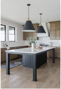 Six Seater Kitchen Island, Blue Kitchen Island Wood Cabinets, Black Kitchen Island Pendants, Matte Black Island Kitchen, Build Your Own Kitchen Island With Seating, Black Island In Kitchen, Low Kitchen Island, Statement Kitchen Island, Kitchen Island And Table Combo Modern