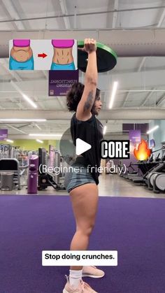 a woman is doing exercises in the gym with her arms up and legs down, while holding