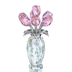 a crystal vase with pink flowers in it on a white background and the bottom is clear