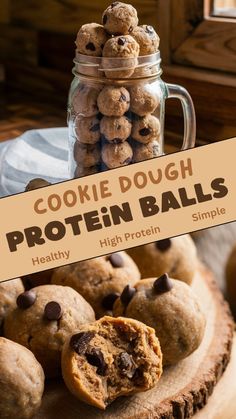 cookie dough protein balls stacked on top of each other next to a jar of cookies