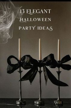 three candles with black bows on them and the words 13 elegant halloween party ideas