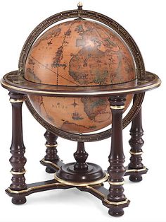 an old fashioned globe on stand with wooden posts and metal trim around the edges, isolated against a white background