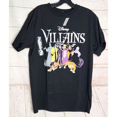 the villain's t - shirt hanging on a wooden wall