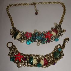 Good Condition With Light Wear. Necklace Measures 17" Long With A 1.5" Extension. Bracelet Measures 6' Long X 1 1/4" Wide. Different Types Of Marine Animals Adorn The Necklace & Bracelet. Gold Costume Jewelry Charm Bracelet With Lobster Clasp, Playful Multicolor Necklace With Lobster Clasp, Vintage Dangle Charm Bracelet With Lobster Clasp, Betsey Johnson Christmas Jewelry, Betsey Johnson Jewelry Necklaces, Sea Necklace, Jewel Of The Seas, Betsey Johnson Jewelry, Chic Leather