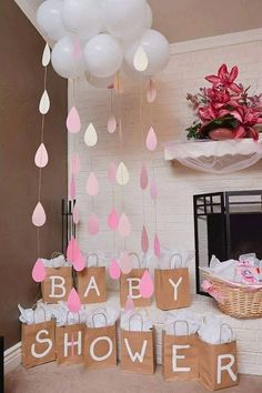 a baby shower party with pink and white decorations