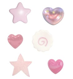 various shapes and sizes of heart, star, moon, and cloud soaps on a white background