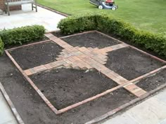 a lawn being laid out in the middle of a yard with a lawn mower