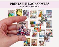 a hand holding up a small book cover with pictures of crochet toys on it