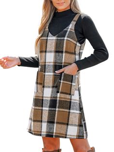 PRICES MAY VARY. [Premium Fabric]: The dress is made of 80% polyester and 20% cotton so that it is breathable and cozy with slightly elasticity. [Unique Design]: The Plaid V-Neck Mini Pinafore Dress. This dress features a classic plaid pattern and a flattering V-neckline, making it a timeless addition to your wardrobe. Step into this pinafore dress and add a dash of retro-inspired style to your everyday look, perfect for those who appreciate a blend of nostalgia and fashion-forward flair. [Perfe Fall Dresses For Women, Green Plaid Dress, Plaid Dresses, Overalls Dress, Woolen Dresses, Red Plaid Dress, Womens Fall Dress, Fall Wear, Fall Dress