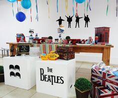 the beatles themed birthday party with balloons and decorations