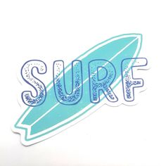 a sticker with the word surf on it and a blue surfboard in the background