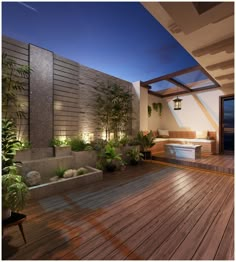 a wooden deck with plants and lights in the night time area next to an outdoor jacuzzi tub