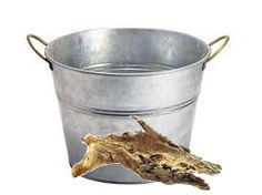 a metal bucket with a piece of wood sticking out of the bottom and inside it