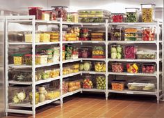 the shelves are filled with many different types of fruits and vegetables