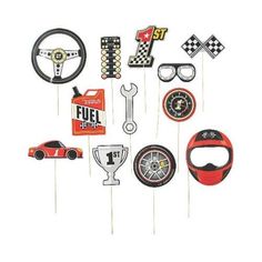 a group of assorted car themed photo props