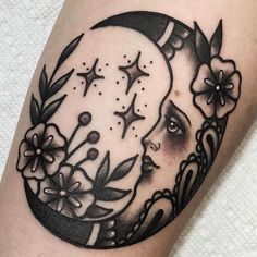 a woman's face with flowers and stars on the side of her arm, next to a crescent moon