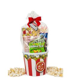 a popcorn bucket filled with snacks and candy