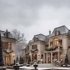 a large house with snow on the ground