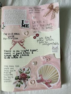 an open notebook with some stickers and writing on the pages that say i love me