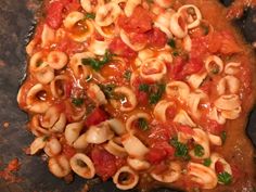 the pasta dish is prepared and ready to be cooked in the oven or on the grill