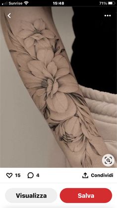 a woman's arm with flowers on it and an instagramr to the side