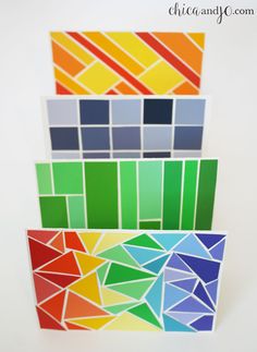 three different colors of paper stacked on top of each other with the same color scheme