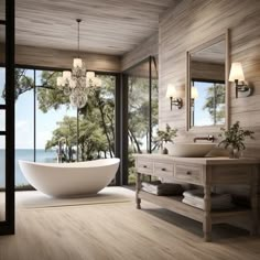 a large white bath tub sitting inside of a bathroom next to a sink and window