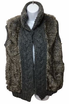 Great Zara Knitwear faux fur vest in a gray color. It has a cable knit sweater neck and middle front. It has hook and eye hidden closures and side pockets. Please ask any questions you may have.   * Pre Owned in Good Condition (Is missing a hook) * Brand Name: Zara Knitwear * Style: Cable Knit Sweater With Faux Fur * Color: Gray * Size: Medium Combined Shipping Available! Will ship worldwide. International bidders please contact me before bidding for shipping price If problem let me know and wil Sweater Neck, Cable Knit Sweater Vest, Zara Knitwear, Gray Vest, Knitwear Style, Knit Sweater Vest, Faux Fur Vest, Faux Fur Vests, Fur Vest