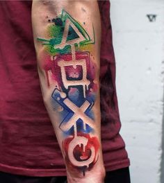 a man with a colorful tattoo on his arm