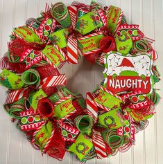 This Wreath is sure to be the perfect addition to your indoor or outdoor decorations this Christmas  season. This wreath is made on a work wreath form using a variety of premium Deco mesh and is accented with a variety of premium wired ribbon in coordinating patterns and textures.   This wreath measures 24-25" in diameter and is 6-7" deep. Thank you so much for visiting my shop. With over 20,000 sales between all selling venues you can purchase with confidence. Be sure to check out all my other listings at: https://Wreath4everyseason.etsy.com Or https://www.etsy.com/shop/Wreath4everyseason **purchase any item and receive a 10% off coupon good towards your next purchase* Grinch wreath, grinch Christmas wreath, grinch decor, grinch wreaths, Christmas wreaths for front door, grinch, merry gri Football Wreath Form Grinch, Grinch Wreath Ideas Diy, Grinch Christmas Swag, Grinch Wreaths Christmas, Diy Swag Wreath, Diy Christmas Wreaths For Front Door, Grinch Wreath Ideas, Grinch Wreath Diy, Deco Mesh Wreath Ideas