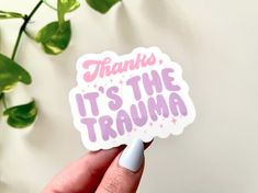 someone holding up a sticker that says, thanks it's the trufma