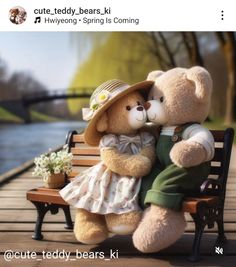 two teddy bears sitting on top of a bench next to each other with flowers in front of them