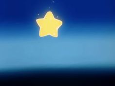 a yellow star floating in the air on top of blue sky with stars above it