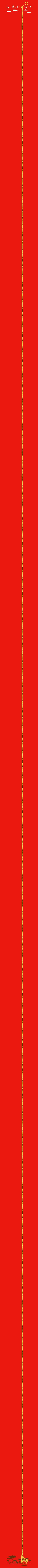 a red and gold floor lamp against a red background