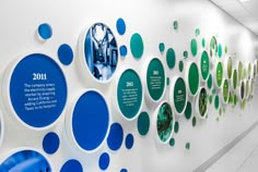 IGS Energy — TENFOLD® | Building Brands Through Culture Office Wall Inspiration, Timeline Wall, Dutch Mill, History Display, Experiential Graphics, Wall Elements, Office Wall Design, Visual Information