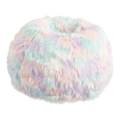 a multicolored bean bag sitting on top of a white surface