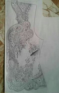 a drawing of a woman's torso with intricate designs on it, in pencil