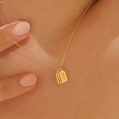 This Monogram & Name Necklaces item by GoldenCoreJewelry has 15254 favorites from Etsy shoppers. Ships from Stafford, TX. Listed on Oct 14, 2023 Dainty 14k Gold Bar Necklace Gift, Dainty Yellow Gold Bar Necklace For Gifts, Dainty Yellow Gold Bar Necklace As Gift, Minimalist Wedding Charm Necklaces, Minimalist Wedding Charm Necklace Tarnish Resistant, Minimalist Bar Necklace For Mother's Day, Minimalist Tarnish Resistant Charm Necklaces For Anniversary, Simple Gold Bar Necklace For Gift, Custom Initial Necklace