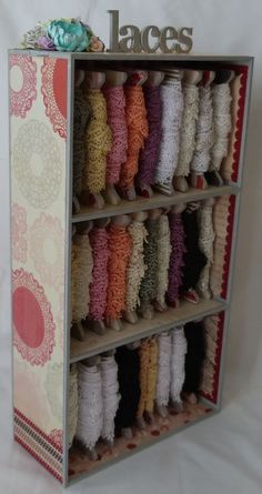 a shelf with many pairs of shoes on it and the words laces above them