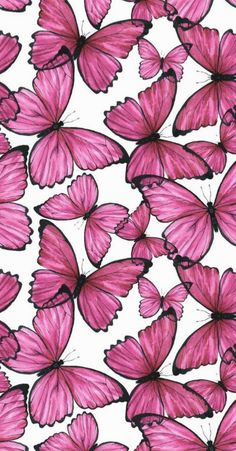 many pink butterflies flying together in the air, with one on top of the other