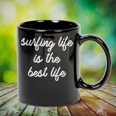 a black coffee mug with the words hunting life is the best life printed on it