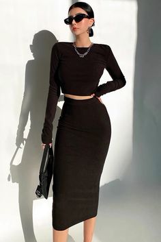 Item Type: TopMaterial: PolyesterPattern: SolidCollar: Round NeckSleeve Length: Long SleeveColor: Black. Brown. GraySize: S.M Size(cm) Clothing Length Bust Sleeve Length Skirt Length Waist Hip S 38 73+ 64 78 60+ 76+ M 39 77+ 65 79 64+ 80+ Trendy Cropped Fitted Skirt, Trendy Fitted Cropped Skirt, Casual Fitted Two-piece Skirt Set, Fitted Black Two-piece Skirt, Black Two-piece Skirt For Party, Black Two-piece Party Skirt, Fitted Two-piece Skirt For Fall, Fall Two-piece Fitted Skirt, Trendy Fitted Two-piece Dress