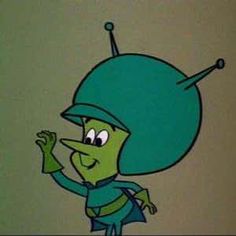 a cartoon character wearing a green hat and blue pants, with one hand in the air