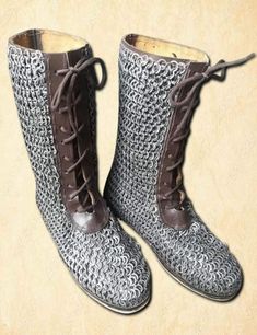 Medieval Leather Chain mail Shoes-9 mm Flat Ring All Ring Dome Riveted Leather chain mail shoes 9 mm 18 gauge flat ring with washer dome riveted Description Material : 100% Natural leather and Mild steel chain mail Shoes size :7.8. 9 ,10 ,11.12 Ring size: 9 mm 18 gauge mild steel chain mail shoes Finish: Oiled and Black Please Note: We do not Ship any parcel on this code APO / FPO Military Addresses, Po Box address as our Courier partners do not book international parcels on these addresses. Ple Knitted Chainmail, Medieval Chainmail, Knit Chainmail, Medieval Chainmail Armor, Medieval Silver Chainmail Jewelry, Medieval Boots, Medieval Shoes, Leather Boot Shoes, Steel Chain