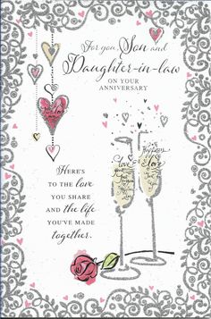 a wedding card with two champagne glasses and hearts