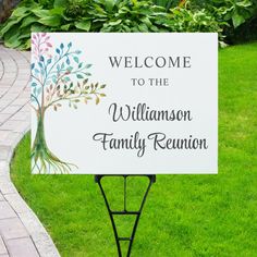 a welcome sign for the family reunion is shown in front of some green grass and bushes